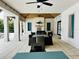 Community pool pavilion with seating area and ceiling fan at 9869 Haze Dr, Venice, FL 34292