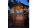 Romantic gazebo with string lights overlooking a pond at 4260 Central Sarasota Pkwy # 213, Sarasota, FL 34238