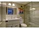 Updated bathroom with white vanity, marble countertop, and walk-in shower at 4550 Pinebrook Cir # 103, Bradenton, FL 34209