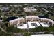 Aerial view of large condo community near water at 4550 Pinebrook Cir # 103, Bradenton, FL 34209