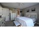 Comfortable bedroom with king-size bed and built-in wardrobe at 4550 Pinebrook Cir # 103, Bradenton, FL 34209