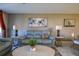Living area with comfortable seating, stylish decor, and a marble floor at 4550 Pinebrook Cir # 103, Bradenton, FL 34209