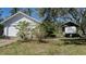 White garage with additional RV parking at 908 Pomelo Ave, Sarasota, FL 34236