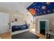 bedroom with a solar system ceiling and a twin-sized bed at 908 Pomelo Ave, Sarasota, FL 34236