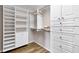 Large walk-in closet with shelving and drawers at 14879 Skip Jack Loop, Lakewood Ranch, FL 34202