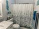 Bathroom featuring a vanity with marble countertop and sea-themed decor at 6006 Hibiscus Dr # 6006, Bradenton, FL 34207
