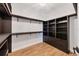 Large walk-in closet with ample shelving and drawers at 1755 Oak Lakes Dr, Sarasota, FL 34232