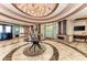 Elegant lobby with high ceilings and water feature at 115 Winding River Trl, Bradenton, FL 34212