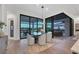 Bright dining room with sliding glass doors leading to the backyard at 1209 Blue Shell Loop, Sarasota, FL 34240