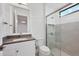 Contemporary bathroom with walk-in shower and vanity at 1209 Blue Shell Loop, Sarasota, FL 34240