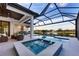 Relax in your private pool and spa with a gorgeous lake view at 1209 Blue Shell Loop, Sarasota, FL 34240