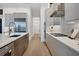 Well-equipped kitchen featuring stainless steel appliances and custom cabinetry at 1209 Blue Shell Loop, Sarasota, FL 34240