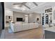 Open concept living room showcasing hardwood floors and high ceilings at 1209 Blue Shell Loop, Sarasota, FL 34240