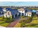 Luxury home with a large backyard and a lake view at 1209 Blue Shell Loop, Sarasota, FL 34240