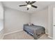 Small bedroom with ceiling fan and window at 14236 Crimson Ave, Bradenton, FL 34211