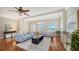Bright living room featuring hardwood floors and ample natural light at 1789 Loma Linda St, Sarasota, FL 34239
