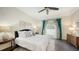 Main bedroom with hardwood floors, and sliding door to backyard at 1789 Loma Linda St, Sarasota, FL 34239