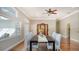 Bright dining room with hardwood floors and a view of the backyard at 1789 Loma Linda St, Sarasota, FL 34239