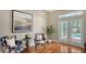 Cozy sitting area with hardwood floors and French doors leading outside at 1789 Loma Linda St, Sarasota, FL 34239