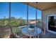 Charming balcony with seating area offering breathtaking views of the surrounding landscape and water at 2715 Terra Ceia Bay Blvd # 201, Palmetto, FL 34221