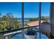 Serene balcony overlooking lush scenery, perfect for enjoying morning coffee or evening sunsets in peace at 2715 Terra Ceia Bay Blvd # 201, Palmetto, FL 34221
