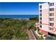 Condominium exterior showcasing lush landscaping and waterfront views on a clear day at 2715 Terra Ceia Bay Blvd # 201, Palmetto, FL 34221