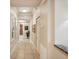 Interior hallway with artwork and tile floor at 2715 Terra Ceia Bay Blvd # 201, Palmetto, FL 34221