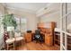 Functional home office with built-in desk and hardwood floors at 2715 Terra Ceia Bay Blvd # 201, Palmetto, FL 34221