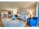 Spacious living room with hardwood floors, a cozy seating area, and abundant natural light throughout the day at 2715 Terra Ceia Bay Blvd # 201, Palmetto, FL 34221
