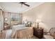 Comfortable main bedroom featuring plush bedding, elegant side tables, and a serene atmosphere for restful nights at 2715 Terra Ceia Bay Blvd # 201, Palmetto, FL 34221