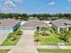 Well-maintained single-story home with a two-car garage and a beautifully landscaped yard at 3718 Mossy Limb Ct, Palmetto, FL 34221