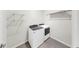 This laundry room features a side-by-side washer and dryer, with room for storage at 3718 Mossy Limb Ct, Palmetto, FL 34221