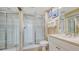 Clean bathroom with a shower, toilet, and a vanity with a countertop at 393 N Point Rd # 603, Osprey, FL 34229