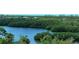 Scenic waterfront view with lush mangrove trees and calm waters at 393 N Point Rd # 603, Osprey, FL 34229