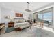 Elegant main bedroom with water views and large windows at 401 Quay Commons # 803, Sarasota, FL 34236