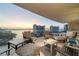 Relaxing balcony with sunset view and comfortable seating at 401 Quay Commons # 803, Sarasota, FL 34236