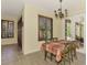 Charming dining area with table, chairs, and access to the backyard at 524 Oak Bay Dr, Osprey, FL 34229