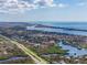 Stunning aerial view showcasing the community's waterfront location at 650 Crane Prairie Way, Osprey, FL 34229