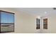 Bedroom with neutral walls and windows with dark trim at 650 Crane Prairie Way, Osprey, FL 34229