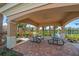 Enjoy outdoor dining in the covered picnic area, overlooking a scenic lake at 650 Crane Prairie Way, Osprey, FL 34229
