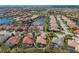 Wide aerial view of the neighborhood and waterfront at 650 Crane Prairie Way, Osprey, FL 34229