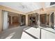 Covered patio with sliding glass doors provides seamless indoor-outdoor living at 650 Crane Prairie Way, Osprey, FL 34229