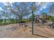 playground with swings and play structure at 650 Crane Prairie Way, Osprey, FL 34229
