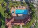 Community pool with surrounding lounge area at 650 Crane Prairie Way, Osprey, FL 34229