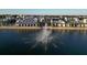 Aerial view of waterfront property with a fountain at 7116 Presidio Gln, Lakewood Ranch, FL 34202