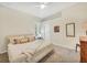 Well-lit bedroom with a light-colored walls, neutral carpet, a ceiling fan, and a closet at 7116 Presidio Gln, Lakewood Ranch, FL 34202