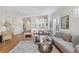 Open concept living room featuring hardwood floors and neutral decor at 7116 Presidio Gln, Lakewood Ranch, FL 34202