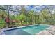 Relaxing screened-in pool and patio area at 9291 Swaying Branch Rd, Sarasota, FL 34241