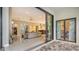 Sliding glass doors open to a patio, offering seamless indoor-outdoor living at 9291 Swaying Branch Rd, Sarasota, FL 34241