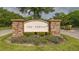 The Forest community entrance sign at 9291 Swaying Branch Rd, Sarasota, FL 34241